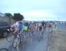 Festival attendees on bikes departing, Folk Festival 2018